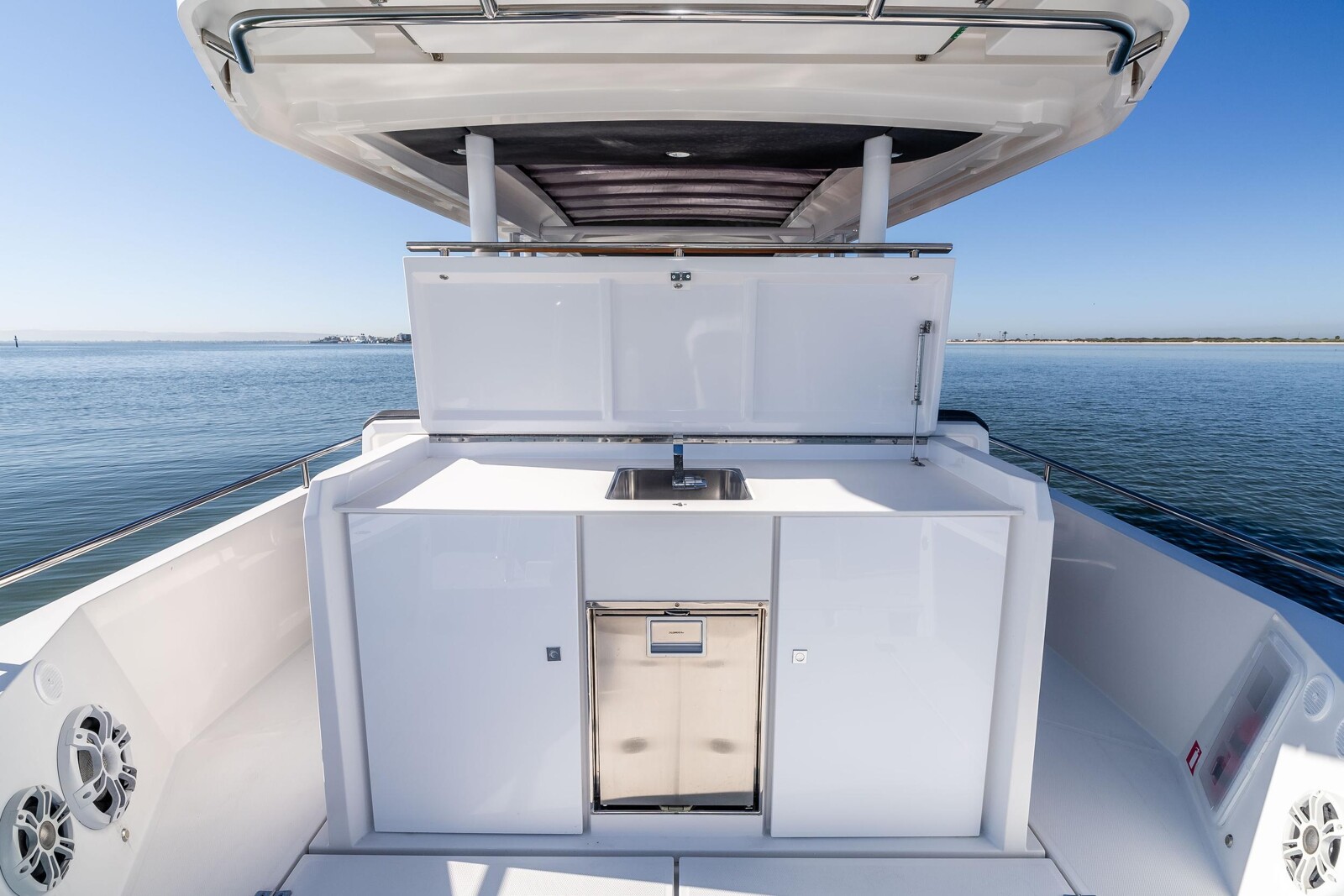 Aft cockpit wet bar aboard the Axopar 37 Mini Mahana