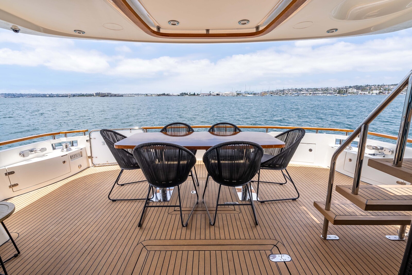 Covered aft deck lounge of the 78-foot Fairline yacht Sea Hammock