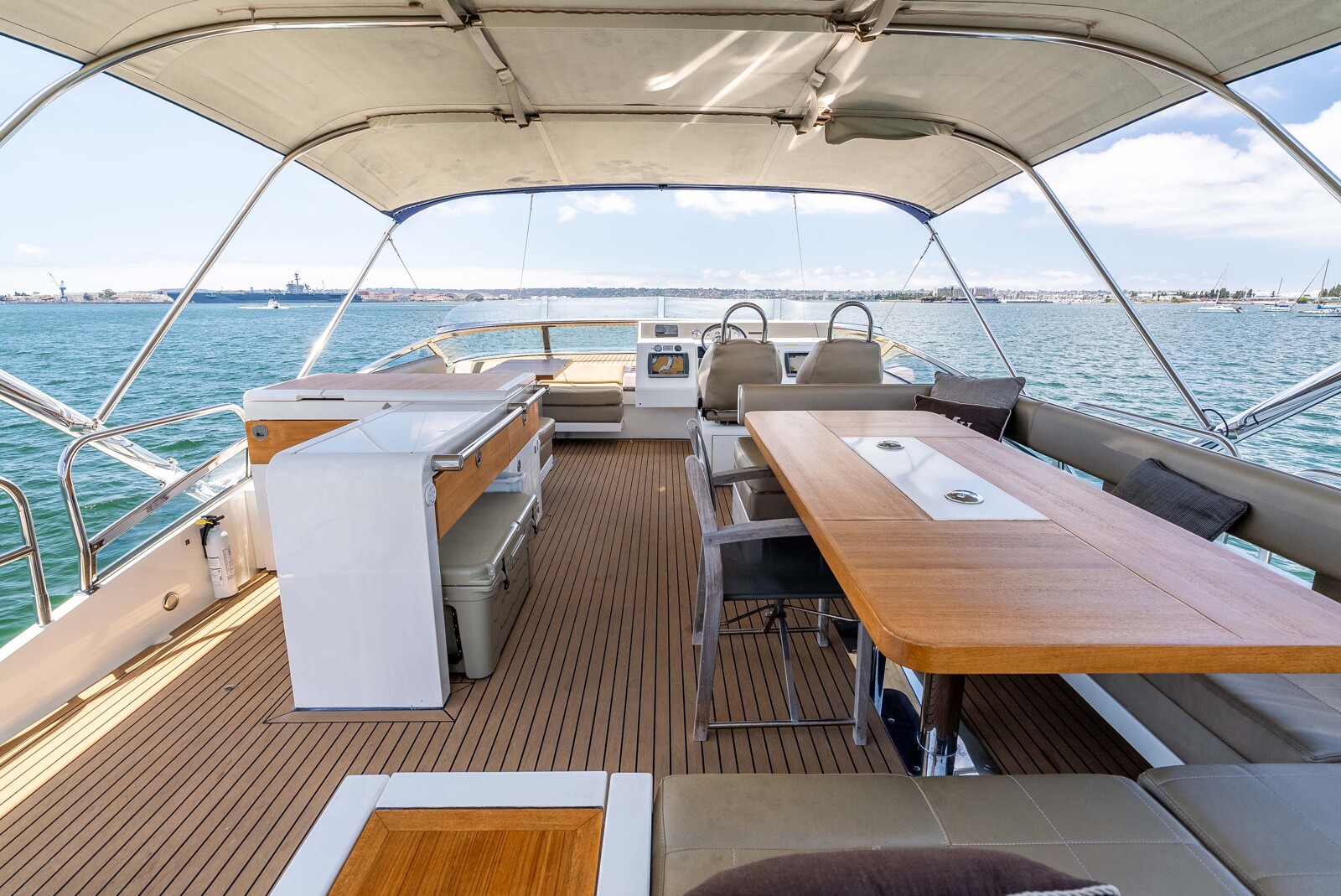 Flybridge helm and lounge seating aboard the Fairline Squadron 78 Sea Hammock