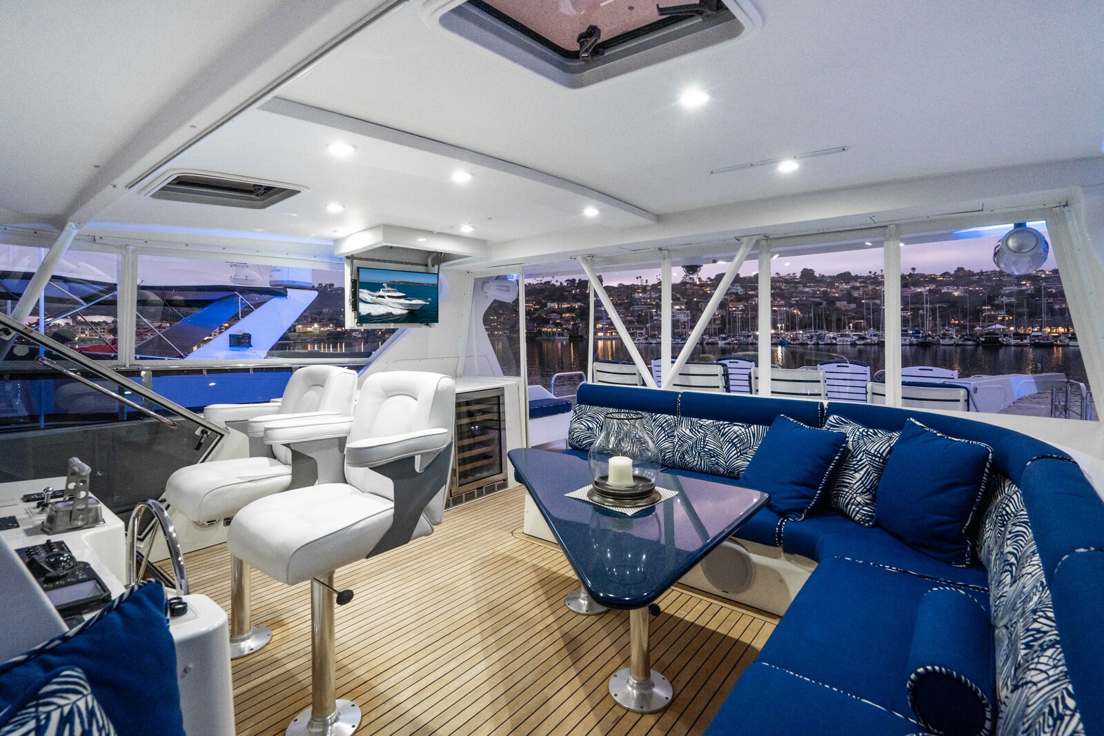 Flybridge of Mahana at dusk, West Bay SonShip 78 for sale through Fraser Yachts