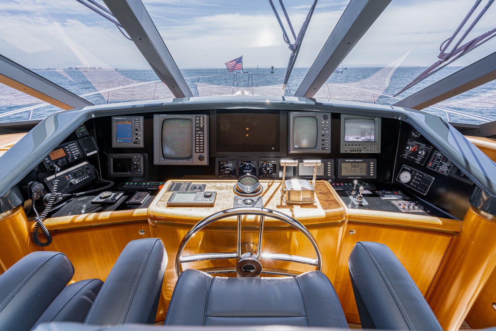 Raised pilothouse helm of the 78-foot West Bay SonShip motor yacht Mahana